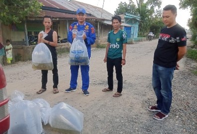 Ditpolairud Polda Jambi Bantu Petani Keramba Jaring  Apung